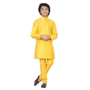 boy wearing yellow kurta set full sleeves with black formal shoes